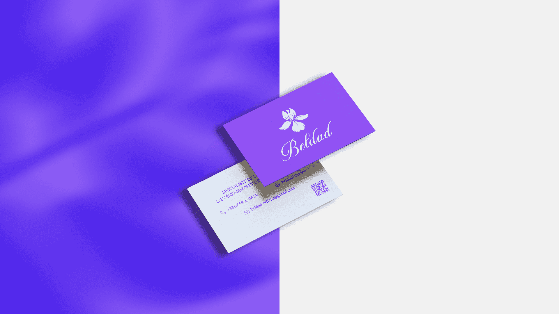 Beldad business cards with the iris symbol on a violet background